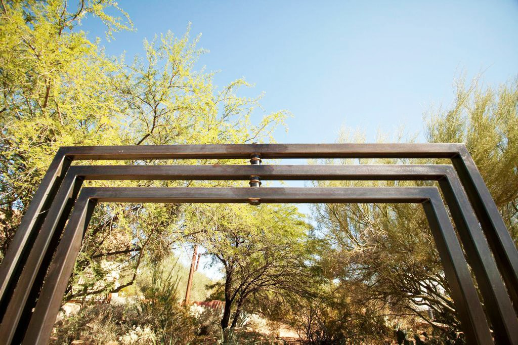 Etazin Square geometric outdoor installation among trees