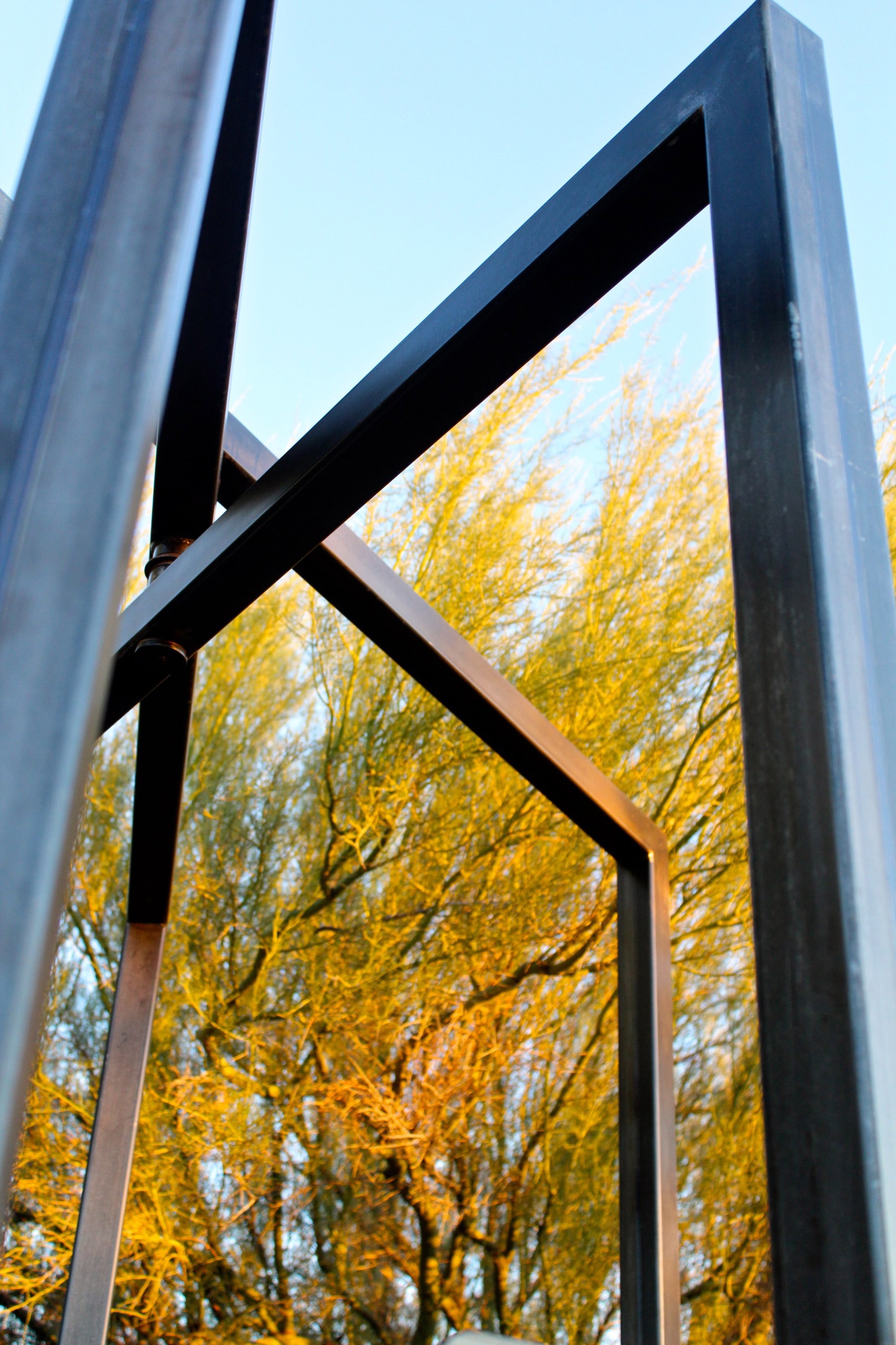 Etazin Square sculpture installed among trees